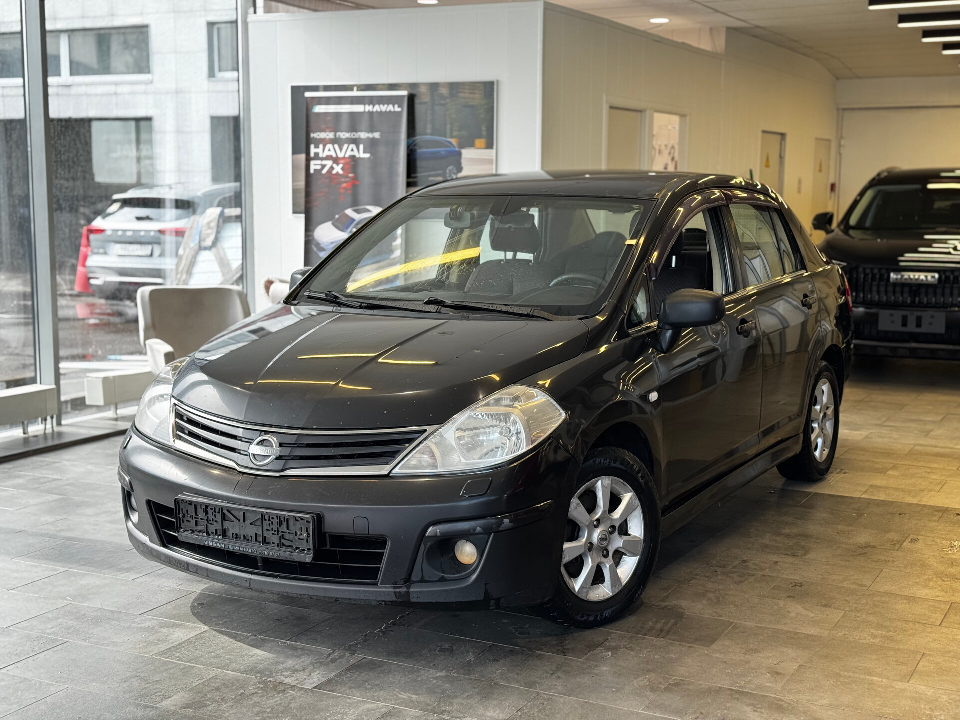 Nissan Tiida 1.6 MT (110 л.с.), 2010