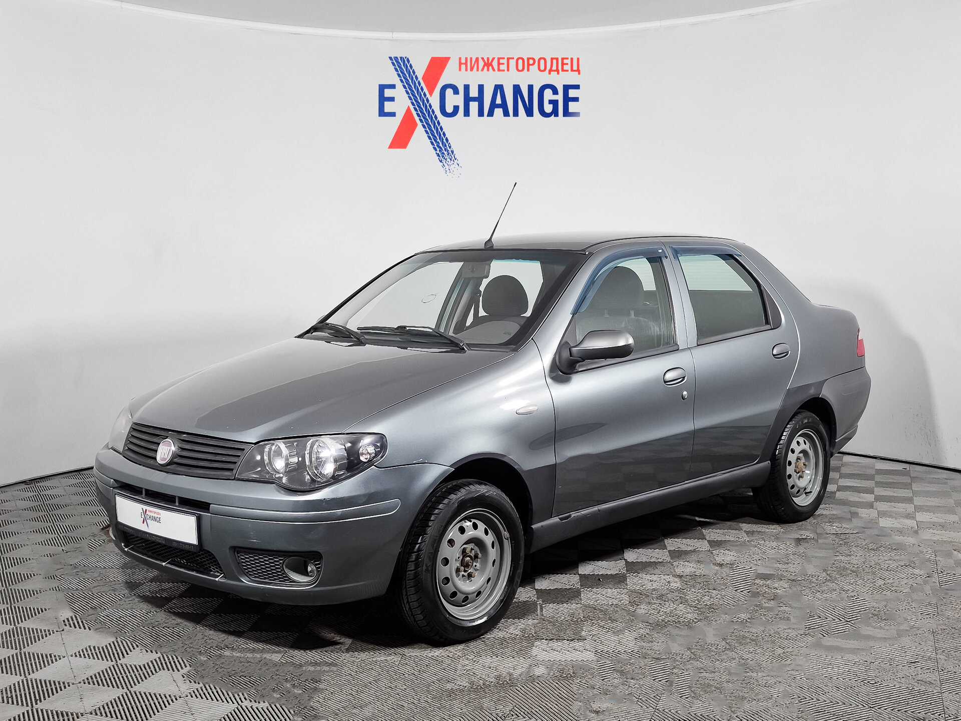 Fiat Albea 1.4 MT (77 л.с.), 2010