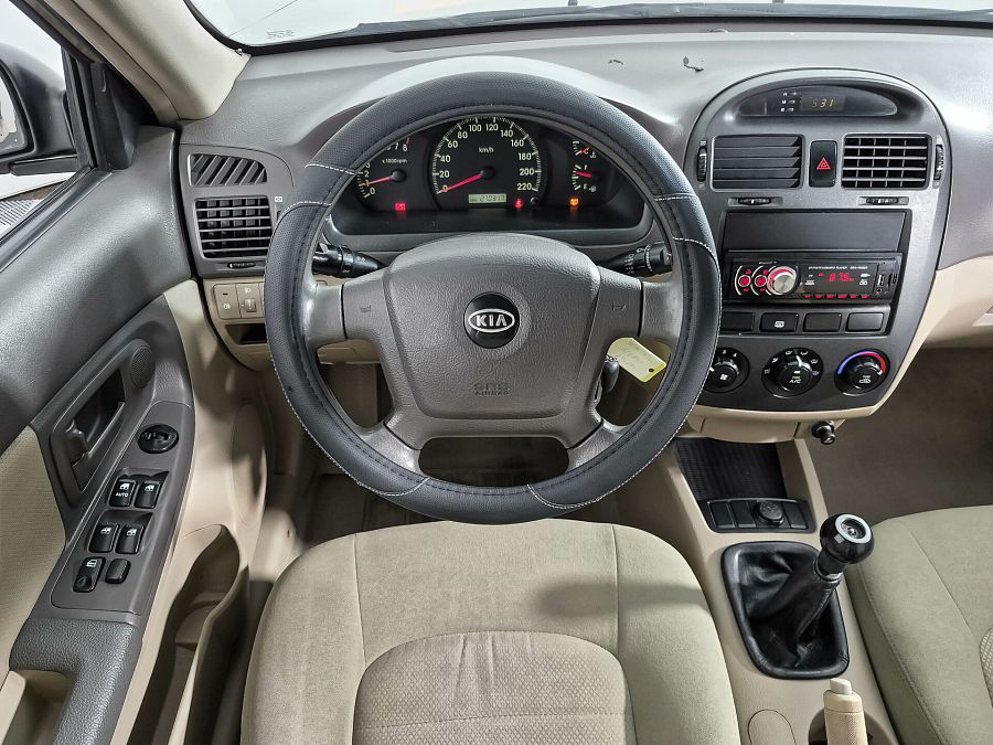 Kia Cerato 1.6 MT (105 л.с.), 2006 Kia Cerato 1.6 MT (105 л.с.), 2006