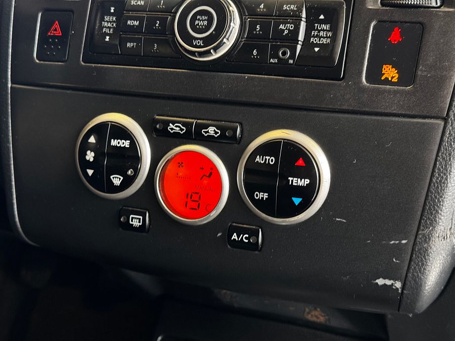 Nissan Tiida 1.6 MT (110 л.с.), 2010