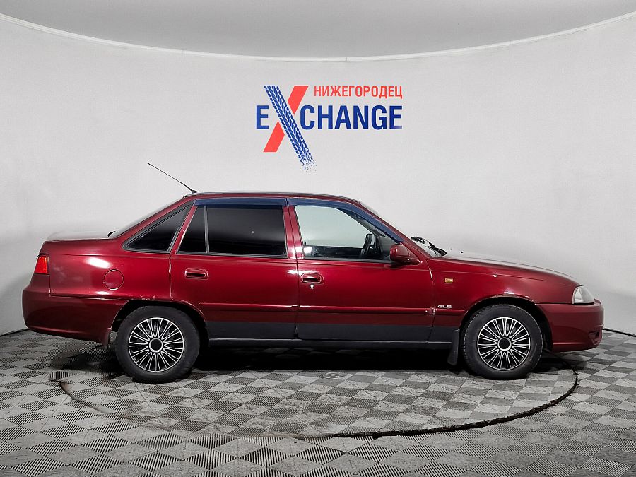 Daewoo Nexia 1.5 MT (80 л.с.), 2010 Daewoo Nexia 1.5 MT (80 л.с.), 2010