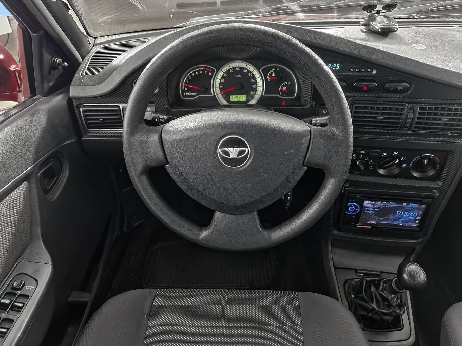 Daewoo Nexia 1.5 MT (80 л.с.), 2010 Daewoo Nexia 1.5 MT (80 л.с.), 2010