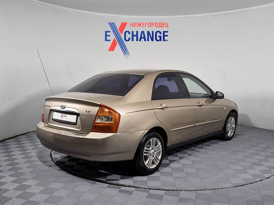 Kia Cerato 1.6 MT (105 л.с.), 2006 Kia Cerato 1.6 MT (105 л.с.), 2006