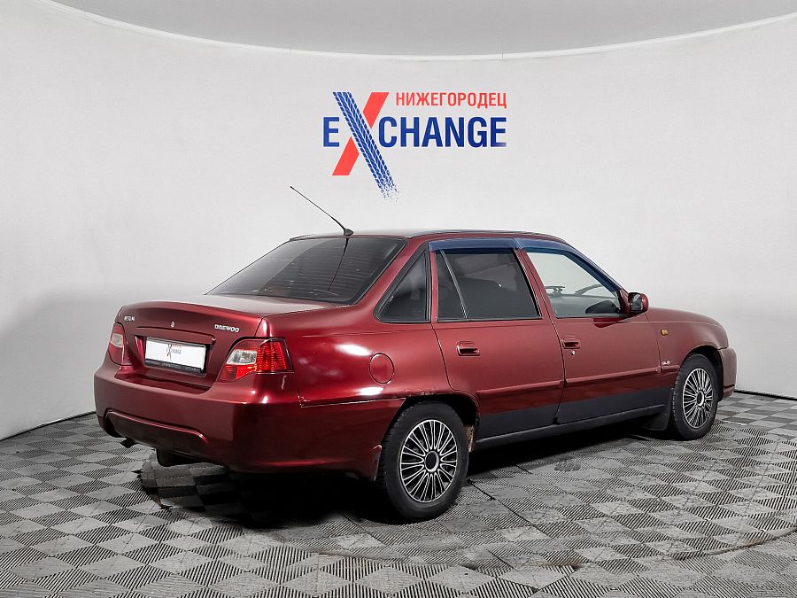 Daewoo Nexia 1.5 MT (80 л.с.), 2010 Daewoo Nexia 1.5 MT (80 л.с.), 2010